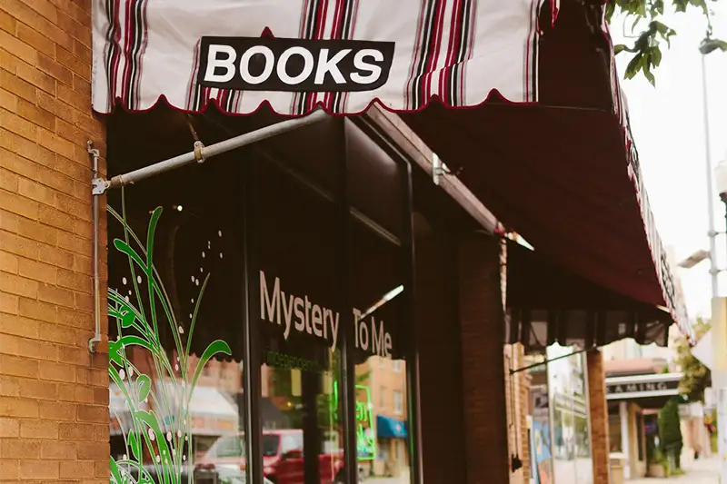 Mystery To Me independent bookstore on Monroe Street, a favorite local destination for book lovers staying at The Buckingham Inn in Madison.